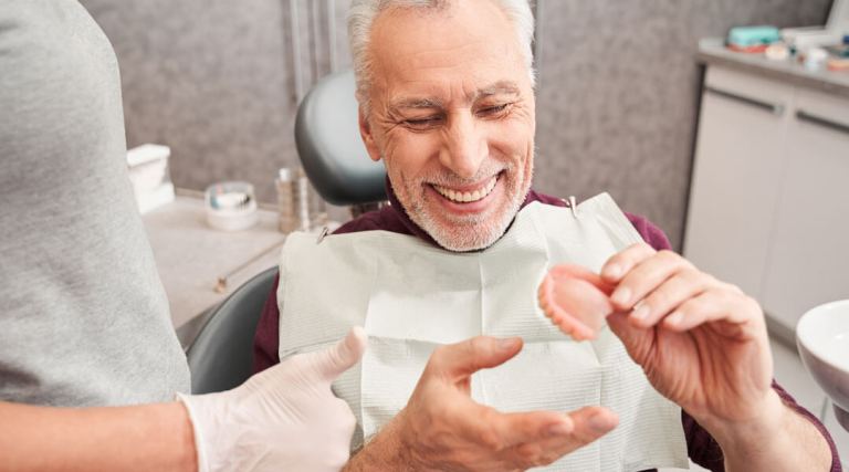Understanding Dentures: Types, Benefits, and Maintenance Tips
